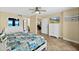 Spacious bedroom with tile floors, beach-themed comforter and a glimpse of the ocean at 3333 S Atlantic Ave # 2202, Daytona Beach, FL 32118