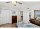 Well-lit bedroom featuring two dressers, a ceiling fan, tile floor and two closets at 3333 S Atlantic Ave # 2202, Daytona Beach, FL 32118
