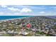 Wide aerial shot showcasing neighborhood proximity to beautiful beach and nearby waterway at 36 Sand Dollar Dr, Ormond Beach, FL 32176