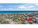 Bright aerial view of the neighborhood showcasing home location and beachside amenities at 36 Sand Dollar Dr, Ormond Beach, FL 32176