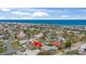 Bright aerial view showcasing this home's location and proximity to the beach and amenities at 36 Sand Dollar Dr, Ormond Beach, FL 32176