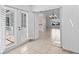 Bright entryway with tile floors, white walls, and glass doors leading to the outside at 36 Sand Dollar Dr, Ormond Beach, FL 32176