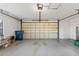 Large garage with garage door, plenty of room for storage and vehicles at 36 Sand Dollar Dr, Ormond Beach, FL 32176