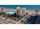 Elevated view highlighting the condo's proximity to the beach, with a pier and coastal scenery in the background at 3647 S Atlantic Ave # 5B, Daytona Beach, FL 32118