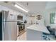 Modern kitchen featuring stainless steel appliances and white countertops at 3647 S Atlantic Ave # 5B, Daytona Beach, FL 32118