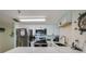 Bright kitchen featuring stainless appliances, updated countertops, and modern cabinetry at 3647 S Atlantic Ave # 5B, Daytona Beach, FL 32118