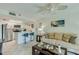 Cozy living room with modern furniture and direct view and access to kitchen area at 3647 S Atlantic Ave # 5B, Daytona Beach, FL 32118