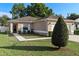 Charming single-story home with a well-kept lawn and inviting curb appeal at 3825 Arborvitae Way, Deland, FL 32724