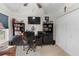 Office space featuring built-in bookshelves and functional work space at 3825 Arborvitae Way, Deland, FL 32724