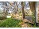 Wooden backyard deck overlooking the water and mature trees at 50 Lake Dr # 1/2, Debary, FL 32713