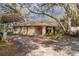 A charming brick home with a covered parking area at 50 Lake Dr # 1/2, Debary, FL 32713