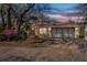 Charming brick home with attached two-car garage and mature landscaping at 50 Lake Dr # 1/2, Debary, FL 32713