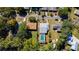 High angle shot capturing a pool and well-maintained backyard surrounded by lush trees at 511 Powers Ave, Port Orange, FL 32127