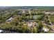 The aerial view showcases a pond and residential neighborhood at 511 Powers Ave, Port Orange, FL 32127