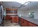 Open kitchen featuring granite countertops, stainless steel appliances, and custom cabinets at 511 Powers Ave, Port Orange, FL 32127