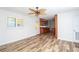 Bright living space featuring stylish flooring, a ceiling fan, and ample natural light at 511 Powers Ave, Port Orange, FL 32127