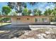 Features an open yard, covered patio, and neutral-toned exterior, perfect for relaxation and outdoor activities at 530 Taylor Dr, Orange City, FL 32763
