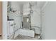 Utility room with water heater, furnace, and shelving units at 530 Taylor Dr, Orange City, FL 32763