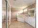 Bathroom featuring a soaking tub, a large shower and double sink vanity at 69 Grey Dapple Way, Ormond Beach, FL 32174