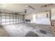 Spacious garage with an automatic door opener, storage cabinets and lots of space at 69 Grey Dapple Way, Ormond Beach, FL 32174