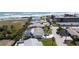 Aerial view of a coastal home with a pool and ocean views at 7 Kathy Dr, Ormond Beach, FL 32176