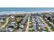Aerial view of homes near the ocean and coastline, perfect for beach lovers at 7 Kathy Dr, Ormond Beach, FL 32176
