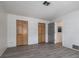 Spacious bedroom boasts wood-look tile floors, neutral walls, and dual closets at 7 Kathy Dr, Ormond Beach, FL 32176