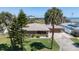Charming single-story home with well-manicured lawn and lush landscaping at 7 Kathy Dr, Ormond Beach, FL 32176