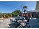 Outdoor dining area featuring a table with seating for six, perfect for outdoor meals at 7 Kathy Dr, Ormond Beach, FL 32176