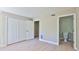 Bright bedroom featuring a spacious closet and an ensuite bathroom with modern fixtures at 709 Cedar St, Daytona Beach, FL 32114