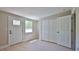 Bright bedroom features a spacious closet and a door leading to the outside at 709 Cedar St, Daytona Beach, FL 32114