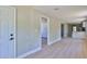 Open-concept living space with sleek flooring, recessed lighting and modern finishes throughout at 709 Cedar St, Daytona Beach, FL 32114