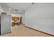 Spacious kitchen featuring stainless steel appliances and wood cabinets with tile flooring at 715 Oak Ter, Orange City, FL 32763
