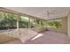 Screened porch with view of the backyard at 715 Oak Ter, Orange City, FL 32763