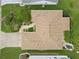 Real estate boasts a well-maintained roof, manicured landscaping, and lush green lawn at 7462 Se 172Nd Fieldcrest St, The Villages, FL 32162