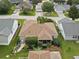 Charming single story home with screened in lanai, mature landscaping, and a spacious backyard at 7462 Se 172Nd Fieldcrest St, The Villages, FL 32162