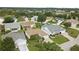 Well-maintained home features manicured landscaping, lush lawn, and a cozy backyard space at 7462 Se 172Nd Fieldcrest St, The Villages, FL 32162