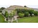 View of a lovely backyard featuring mature trees and a stone patio at 7462 Se 172Nd Fieldcrest St, The Villages, FL 32162