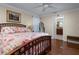 Inviting bedroom with ensuite bathroom featuring comfortable bed and decor at 7462 Se 172Nd Fieldcrest St, The Villages, FL 32162