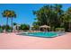 Community swimming pool with lounge chairs, perfect for relaxation and enjoying the outdoors at 811 Smokerise Blvd, Port Orange, FL 32127