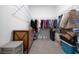 Spacious walk-in closet with shelving, storage bins, and ample room for organization at 9033 Cape Cod Rd, Deland, FL 32724