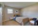 Well-lit bedroom featuring a large window and plenty of space at 912 Tree Garden Dr, Port Orange, FL 32127
