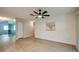 Cozy living area with a ceiling fan and bright lighting at 912 Tree Garden Dr, Port Orange, FL 32127