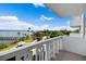 Enjoy the beautiful water views from this condo's balcony, complete with white railings and clear sightlines at 935 N Halifax Ave # 309, Daytona Beach, FL 32118