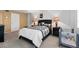 A cozy bedroom with a comfortable bed, neutral colors, and ample natural light creates a peaceful retreat at 935 N Halifax Ave # 309, Daytona Beach, FL 32118