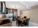 A kitchen with dark wood cabinets, stainless steel appliances, and a granite countertop is a lovely space at 935 N Halifax Ave # 309, Daytona Beach, FL 32118