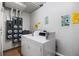 A functional laundry room offers convenience with its washer, dryer, and utility connections at 935 N Halifax Ave # 309, Daytona Beach, FL 32118