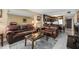 The well-lit living room features stylish seating arrangements, providing an inviting area for relaxation and entertainment at 935 N Halifax Ave # 309, Daytona Beach, FL 32118