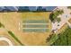 Aerial view of shuffleboard courts surrounded by green space and landscaping at 935 N Halifax Ave # 309, Daytona Beach, FL 32118