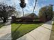 Welcoming community entrance with brick signage, lush landscaping, and a gated entry at 1222 Brandy Lake View Cir, Winter Garden, FL 34787